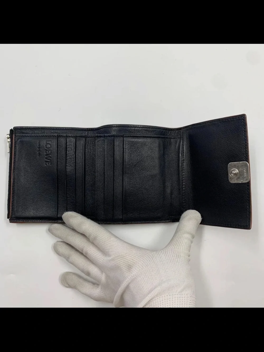 Loewe compact trifold